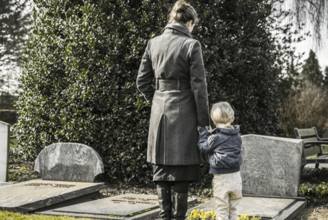 Mum and child in a cemetery